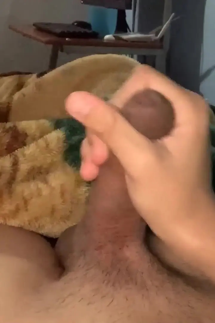 calmx slowly jerking his uncut cock and cums on his shaved pubes