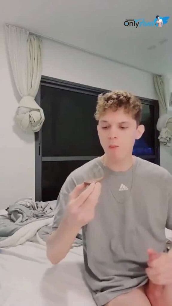 Cute twink enjoying himself a nice cum biscuit while jerking off